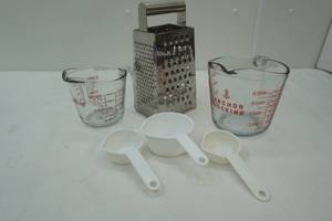 lot 120 image: 2 Anchor Hocking Glass Measuring Cups, Stainless Steel Grater, Poly Measuring Cups