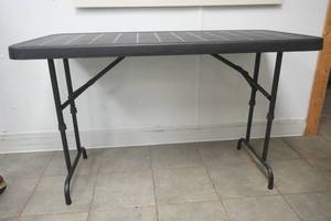 lot 226 image: Black Rectangle Folding Table. 48x23.5x 28