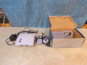 lot 175 image: Super Nintendo with Games