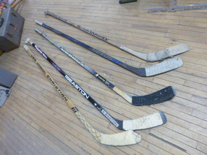 lot 213 image: 5 Hockey Sticks