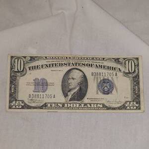 lot 49 image: 1934C Silver Certificate AU, withError Line in the word Silver