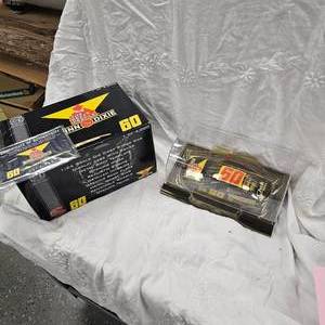 lot 93 image: Racing Champion 124 Authentics Mark Martin Winn-Dixie #60