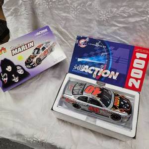 lot 101 image: Action 124 KISS Coors Light, Sterling Marlin