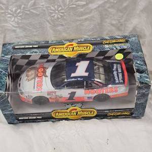 lot 111 image: American  Muscle by Ertl 118th  Hooters Rick Mast #1