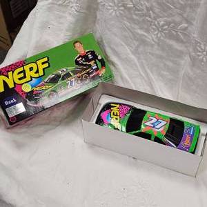 lot 123 image: Action 124 Bank Nerf, Kenny Irwin #27