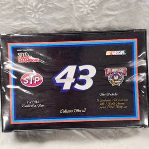 lot 133 image: Racing Champions Richard Petty #43, 12 Piece Collection , in case