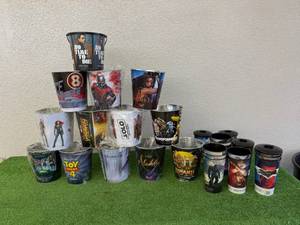 lot 144 image: Movie Theater Popcorn Tins & Soda Cups