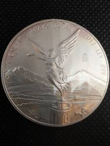 lot 53 image: Mexican Libertad 1 oz Silver Coin - .999 Fine