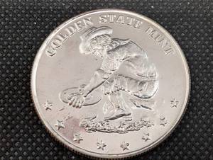 lot 65 image: Golden State Mint Prospector 1 oz .999 Fine Silver Round - Wagon Train Design