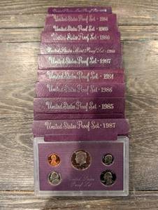 lot 184 image: United States Proof Set Collection - Purple Cases, Assorted Years (1984-1992) (Lot Of 10)