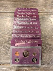 lot 191 image: United States Mint Proof Sets Lot - 1984-1990 in Purple Card Packaging (Lot Of 10)