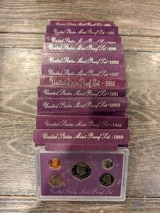 lot 199 image: United States Mint Proof Sets Purple Card Boxes - Assorted Years (Lot Of 10)