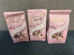 lot 249 image: 3 Bags Of Lindt Neapolitan Chocolates