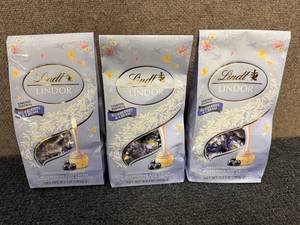 lot 250 image: 3 Bags Of Lindt Blueberries And Cream Chocolates