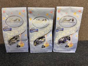 lot 251 image: 3 Bags Of Lindt Blueberries And Cream Chocolates