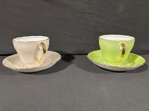 lot 28 image: 2x Teacups With Saucers - Pink & Lime Green