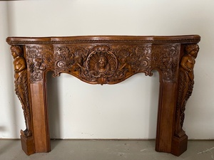 lot A-67 image: Carved Oak Fireplace Mantel with Cherubs