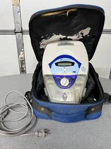 lot 80 image: MSRP $1800 ResMed S7 Lightweight Support CPAP Machine - Includes Travel Bag, Power Cord, Reservoir -&nbsp&nbspLike New Working Condition