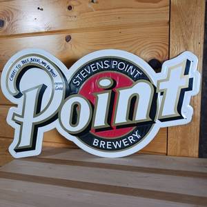 lot 28 image: Stevens point brewery flat metal sign, signed.