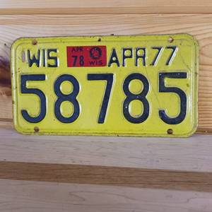 lot 50 image: 1977 Wisconsin April � License Plate � raised letters � 8 inches
