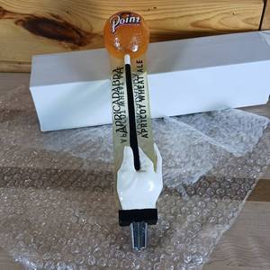 lot 58 image: Apricadabra beer tap handle (not a typo) lol  Apricot Wheat Ale � Stevens Point Brewery with original packaging