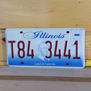 lot 74 image: Illinois embossed plate -full size license plate - Land of Lincoln