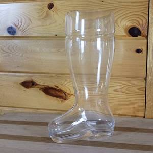 lot 78 image: Mrs. Santa Claus Boot Leg Pitcher
