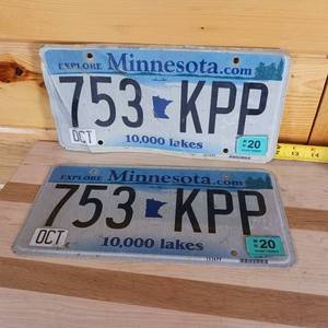 lot 93 image: Not embossed two piece matching set of Minnesota Plates 2020 � one is good, one is bad