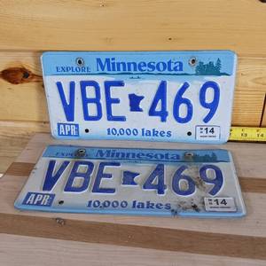lot 104 image: Matching set 2014 Minnesota letters embossed full size license plates