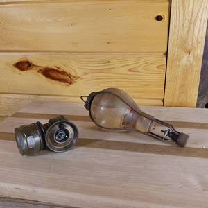 lot 116 image: Antique 1800s Red Comet Grenade Fire Extinguisher - Hanging Spring Loaded�- From Skating Rink in Southern Illinois � also include hat lantern (auto-lite) patented universal Lamp Co. Made in USA