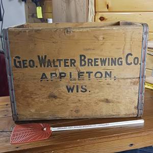 lot 117 image: Geo Walter Brewery wooden crate with metal banding (for 32 oz bottles) with matching Adler Brau fly swatter