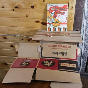 lot 118 image: Adler Brau lot with Brand New Reusable Box, ad sign and Take along an Adler 8 Pack sign.