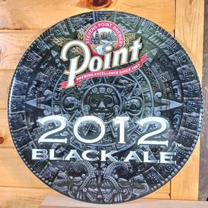 lot 138 image: Round Metal Sign with Mayan Background � 2012 Point Black Ale -