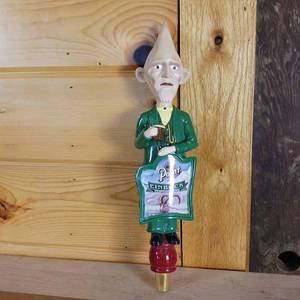 lot 186 image: Point Beer tap handle � Einbock Maibock Style � 11 inches tall in like new condition and point man is holding a beer � Handcrafted