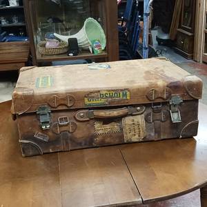lot 2 image: Awesome Antique Leather Travel Trunk � Heavy latches and hardware � the real thing, not a copy  Swedish Stickers from early travelers by train  From Merchant Marine 1940s.