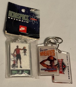 lot 70 image: (3) Michael Jordan Key Chains
