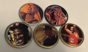 lot 74 image: (5) Michael Jordan Metal Slammer Coins