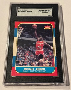 lot 1 image: Michael Jordan RC 1986 Fleer #57 SGC Authenticated - MOST ICONIC BASKETBALL ROOKIE CARD OF ALL TIME