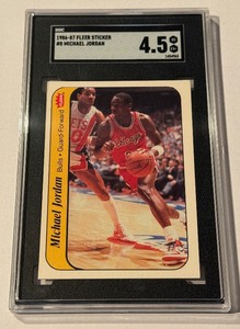 lot 2 image: Michael Jordan RC 1986 Fleet Sticker #8 SGC Graded 4.5 - SECOND MOST ICONIC BASKETBALL ROOKIE CARD OF ALL TIME