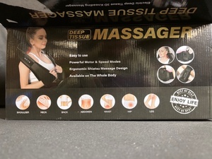 lot 10 image: 4-Function Deep Tissue Massager
