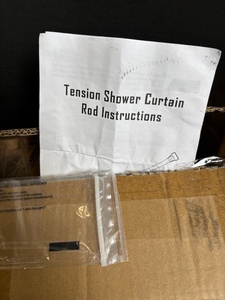 lot 39 image: Tension Shower Curtain Rod - Black, Adjustable