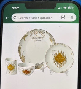 lot 82 image: Harry Potter Marauders Map 4-Piece Porcelain Dinner Set