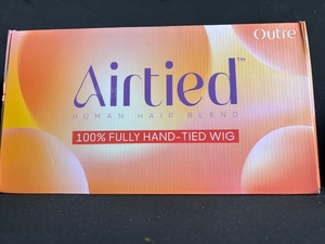 lot 95 image: Outre Airtied 100% Fully Hand-Tied Wig - Human Hair Blend