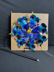 lot 165 image: Blue Rainbow Owl Wind Spinner Center Flower - Garden Sculpture