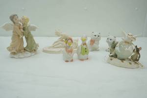 lot 56 image: Porcelain Figurine of two angels, kitten figurines, ceramic geese salt & pepper shaker, ballerina sculpture
