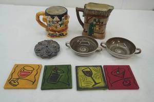 lot 78 image: Vintage Royal Doulton Oliver Twist series pitcher, ,Christmas Mug, 2 handled shallow dishes, coasters