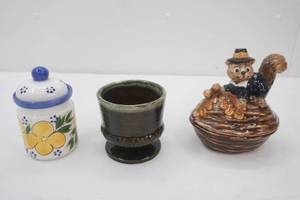lot 86 image: Vintage Squirrel nut dish, ACK floral lidded jar, hull Pottery  Green Planter