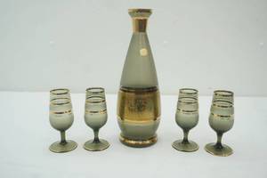 lot 91 image: Vintage Mid Century Modern Bohemian Czech Wine Decanter with 4 Cordial glasses smoke gray frosted glass with gilded accents