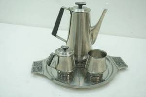lot 170 image: Vintage Mid Century  Modern  International Stainless coffee pot with creamer and sugar bowl