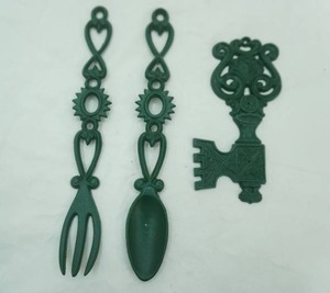 lot 236 image: Cast Iron Key, Spoon, and Fork Wall Hanging (green Color)